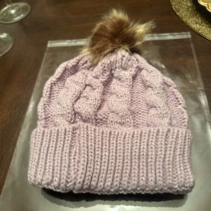 New in Packaging. Women’s Lavender Puff Beanie. Perfect for the Coldness.
